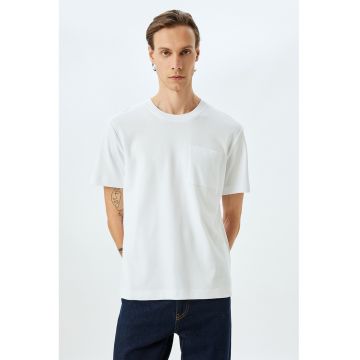 Tricou din bumbac cu decolteu la baza gatului si model uni