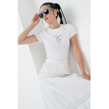 Tricou din amestec de bumbac organic cu imprimeu grafic pe partea din fata
