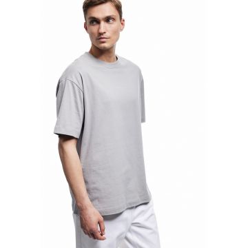Tricou din bumbac cu model uni si decolteu la baza gatului
